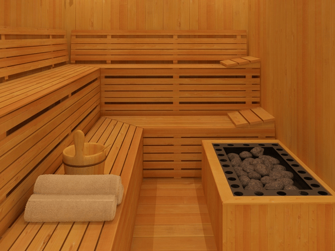 The interior of a traditional wooden sauna, showcasing its tiered benches and warm, inviting ambience